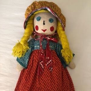 Handmade doll with yellow pigtails